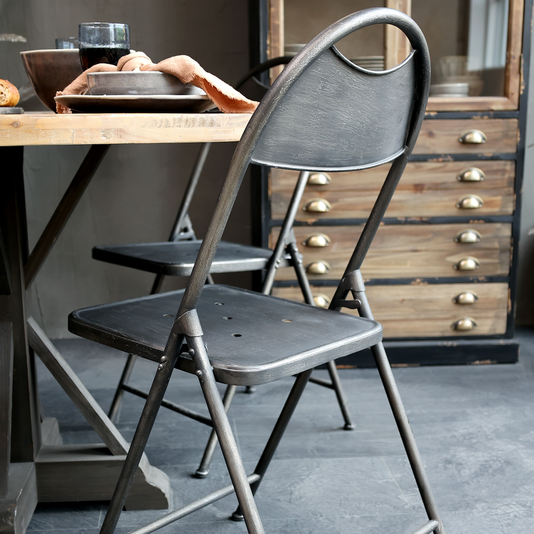 A Pair Of Factory Style Folding Chairs