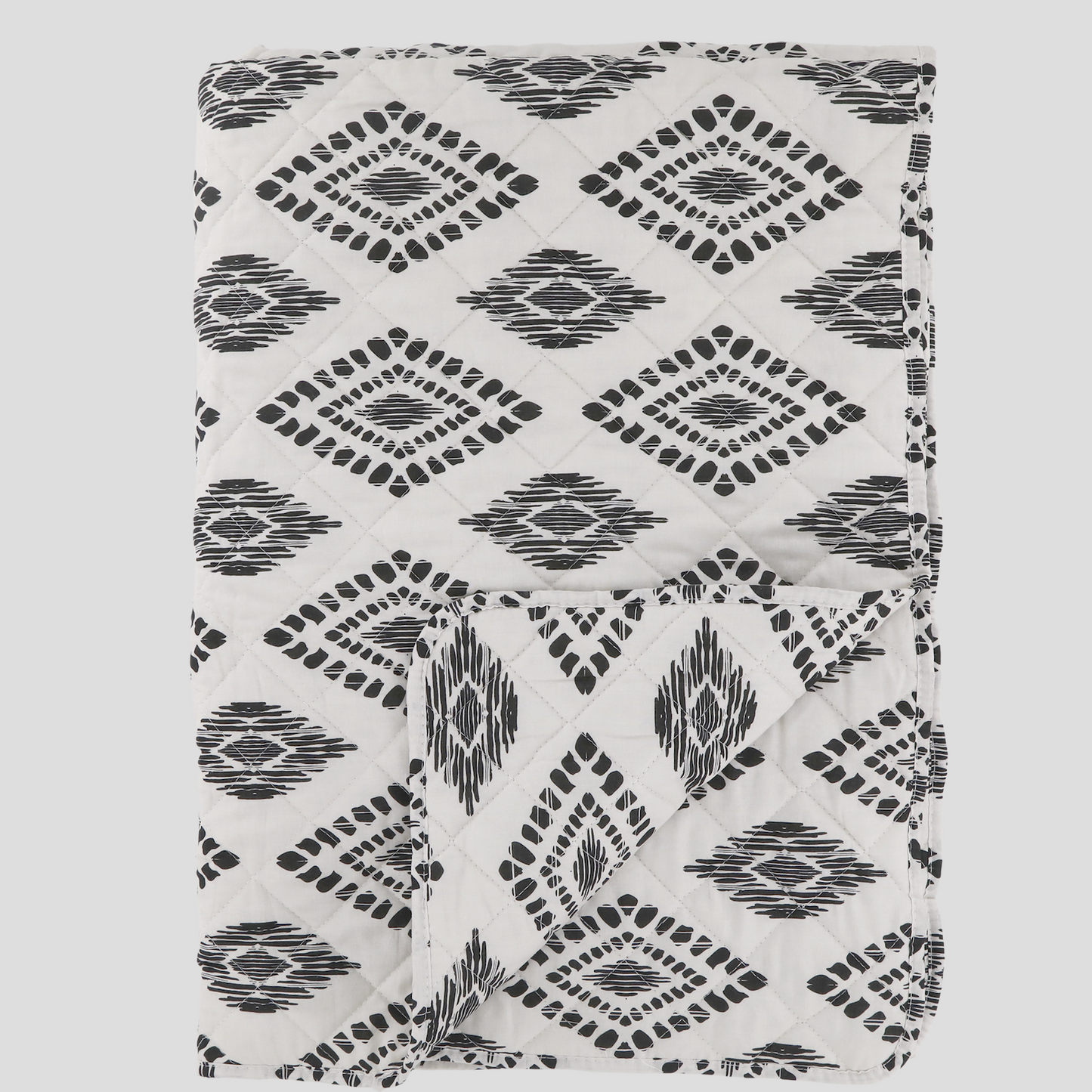 Black And White Patterned Quilt