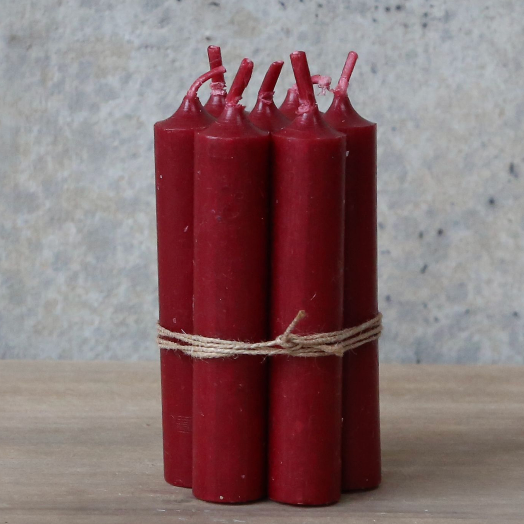 A Bundle Of Six Short Dark Red Candles