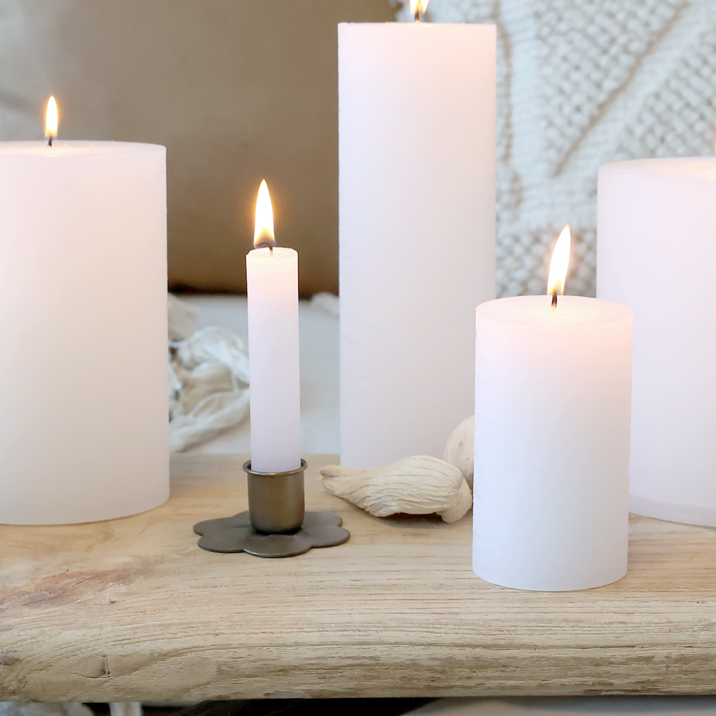 A Bundle Of Six Short Clear White Candles
